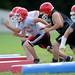 Whitmore Lake football players take off during a practice drill at the school on Tuesday, August 13, 2013. Melanie Maxwell | AnnArbor.com
